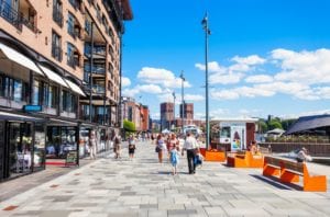 The bustling Aker Brygge in Oslo, Norway on a summer day.